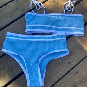 Brand new, never worn blue and white swim suit